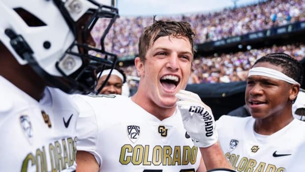 Trevor Woods smiling after 45-42 win at TCU